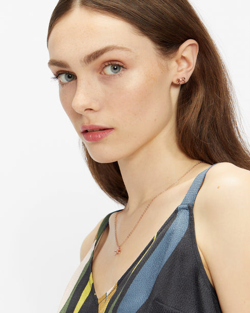 <P>Petite Bow Stud Earring</P>